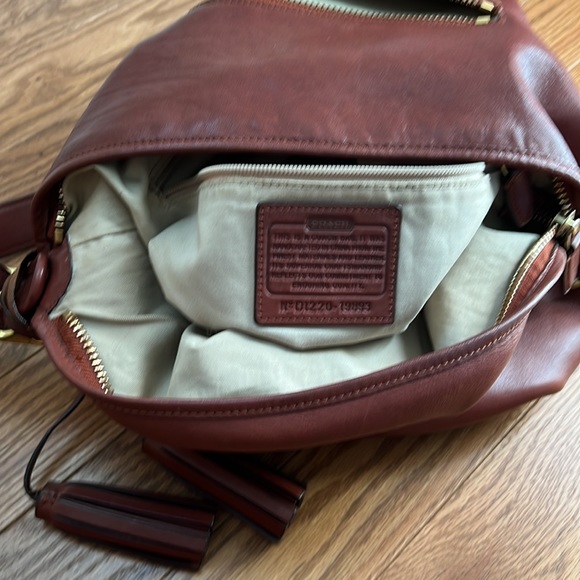 Saddle-color Coach Crossbody Bucket - Picture 3 of 14